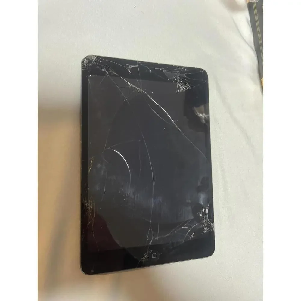 Apple iPad with Cracked Screen and Back Damage screen locked